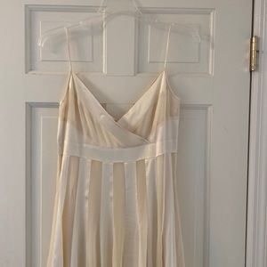 Diane von Furstenberg slip dress and over coat.